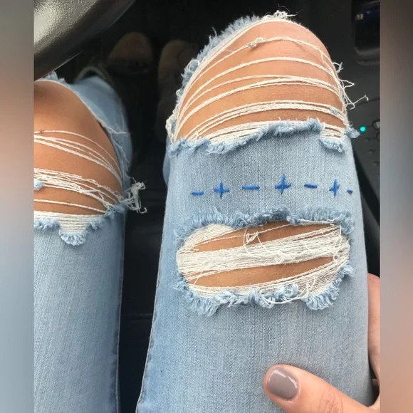 embroidered jeans๐ light to mid wash denim with distressed hems and rips - Picture 4 of 9